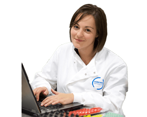 Legionella consultant typing on a laptop